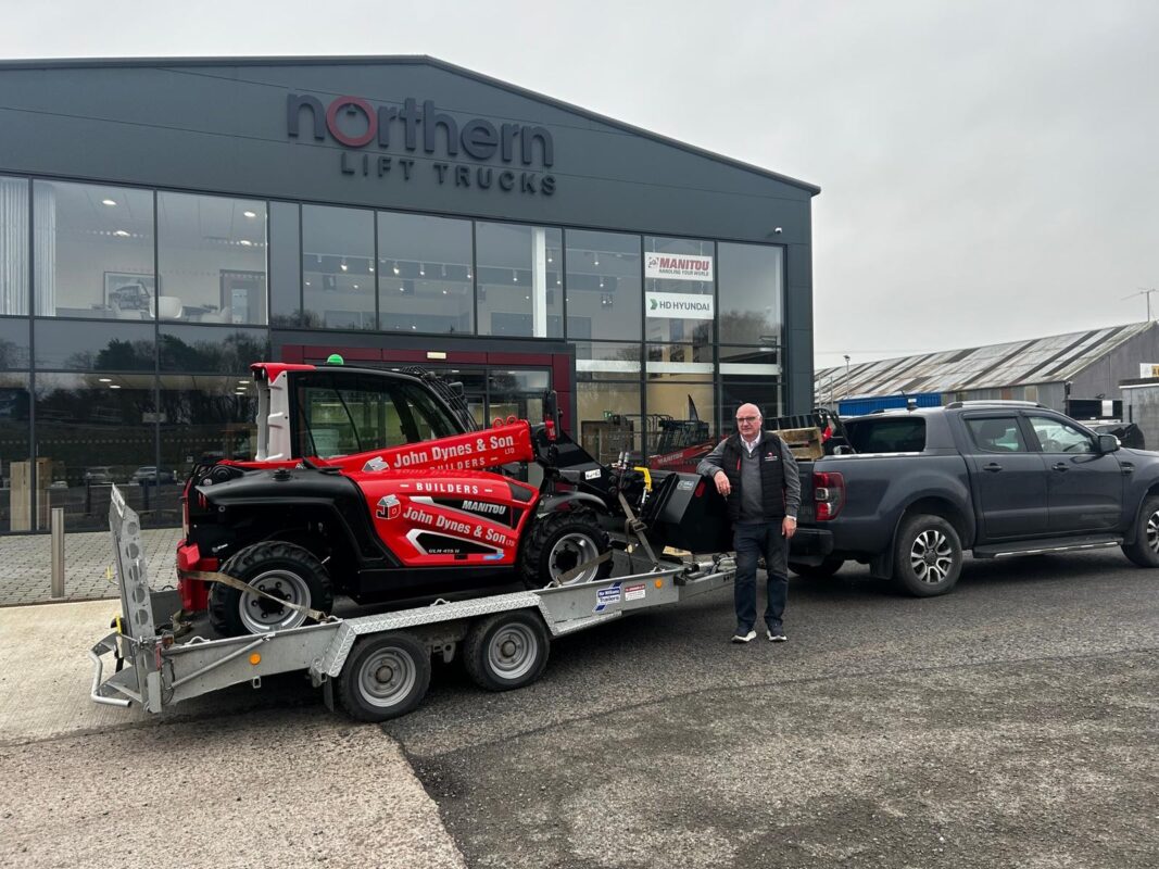 Customer John Dynes collecting new ULM415 Manitou 
ultralight telehandler from Northern Lift Trucks